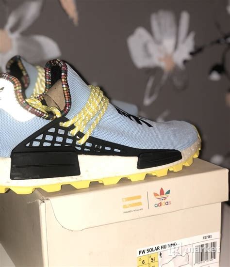boty adidas human race